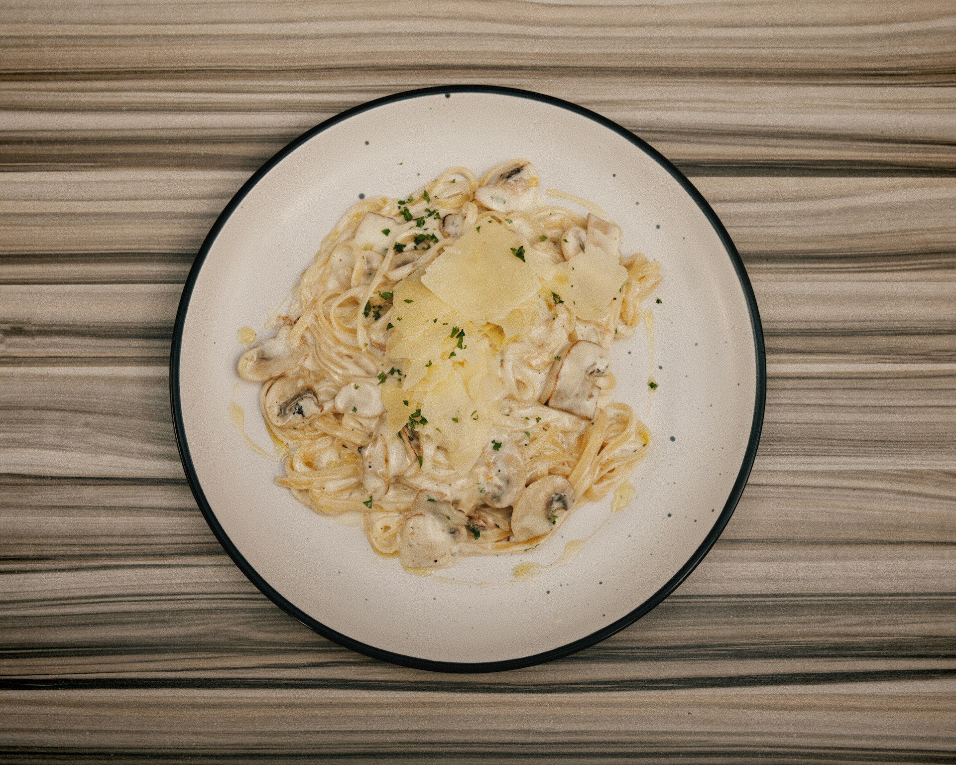 A plate of food on a wooden table